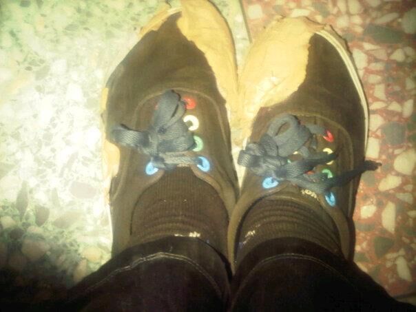 Chima Mmeje couldn't afford new shoes, so sheused band-aids to tape the soles when they wore off

Picture taken on August 26, 2012